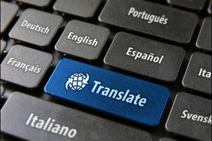Foto van een toetsenbord, met op de enter-toets het woord 'translate'.